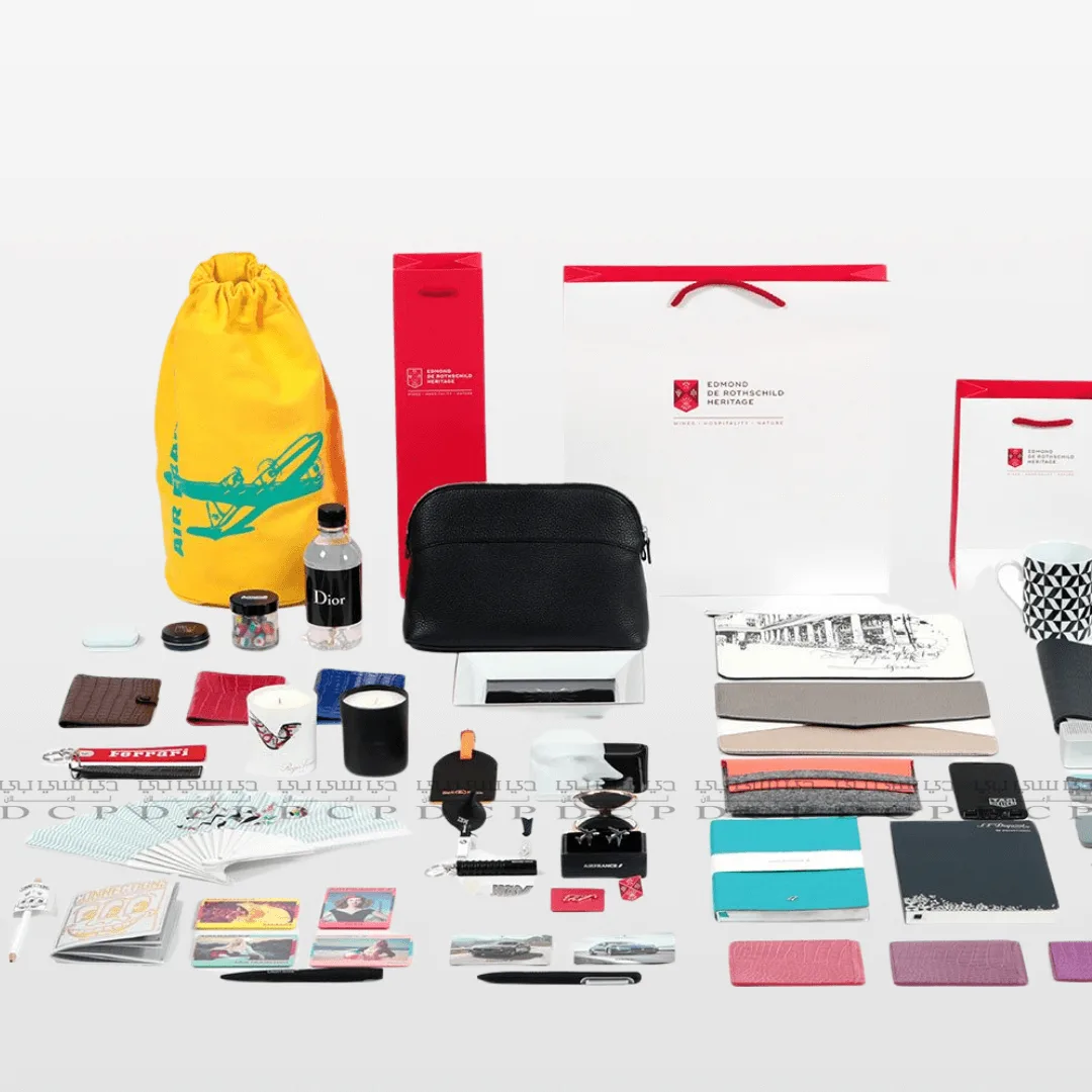 Full view of various custom branded merchandise items including T-shirts, mugs, bags, and stationery, all featuring personalized designs