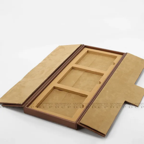 Close-up of the interior slots in the Stylish Brown PU Box, showcasing its practical design for organized storage
