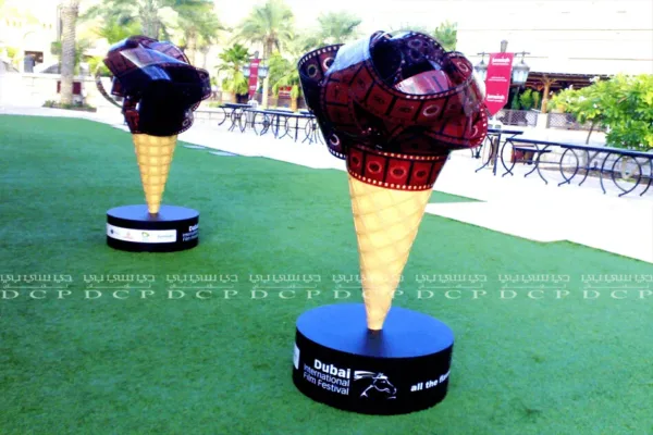 Full view of a unique cinema award in the shape of an ice cream cone, featuring intricate detailing and a premium finish