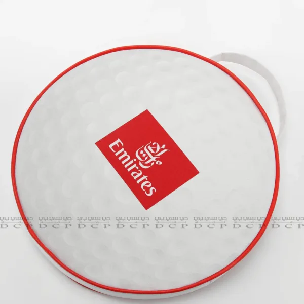 Full view of a round golf ball textured cushion with a realistic sports-inspired design, perfect for décor or gifting