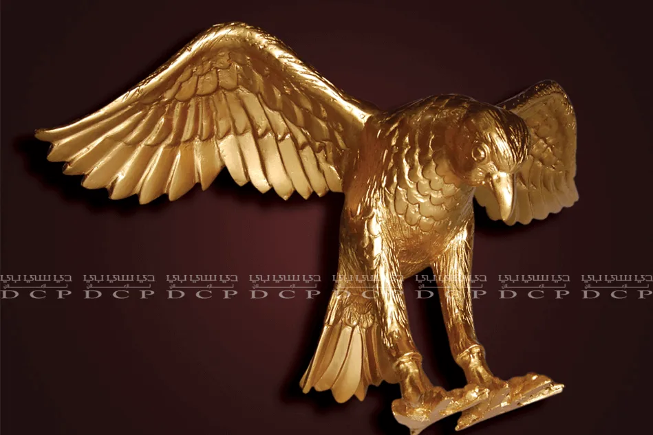 Golden eagle sculpture in mid-flight, wings spread wide with intricate detailing, perfect for luxury decor
