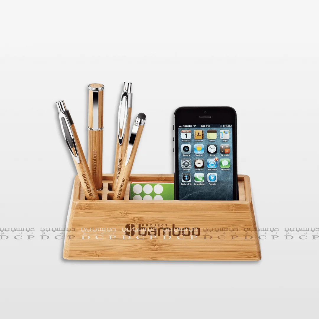Full view of a wooden desk organizer designed to hold a mobile phone and pens, providing a clean and organized workspace